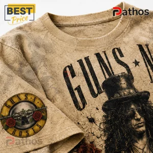 Tan cotton t-shirt featuring Guns N' Roses band logo, a portrait of Slash, and a distressed lace-like background pattern.!