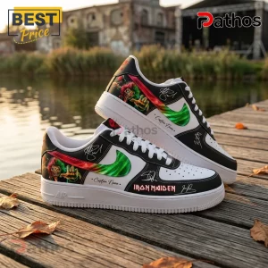 Customized black and white Iron Maiden sneakers featuring Eddie graphics, neon green swooshes, and signature details.!