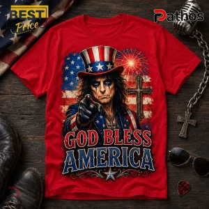Alice Cooper One Nation Under God 250 Years Red T-Shirt 1 Red graphic t-shirt featuring Alice Cooper as Uncle Sam, an American flag background, fireworks, and cross iconography.!