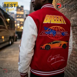 Red and white varsity jacket featuring an embroidered orange sports car, the text BREEZY, a globe icon, and a signature.!