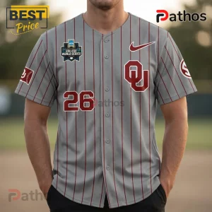 Grey baseball jersey with crimson pinstripes, Oklahoma Sooners OU logo, number 26, Nike swoosh, and World Series patch.!