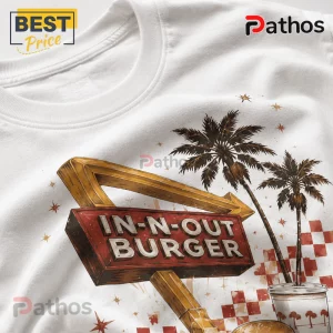 White cotton t-shirt featuring an In-N-Out Burger vintage sign graphic, palm trees, and red checkered pattern.!