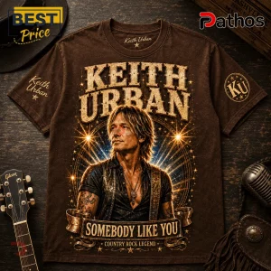 Brown Keith Urban Somebody Like You graphic t-shirt with gold lettering, star accents, and starburst background effect.!