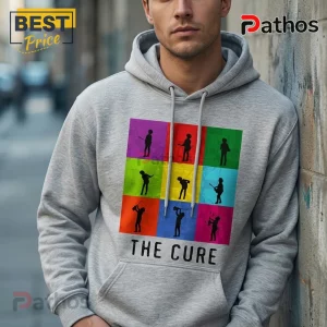 Grey pullover hoodie featuring a grid of nine multicolored squares with black musician silhouettes and The Cure text below.!