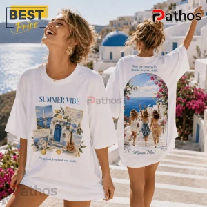 White graphic t-shirt featuring Greek island collage art on the front and three women walking toward the ocean on back.!
