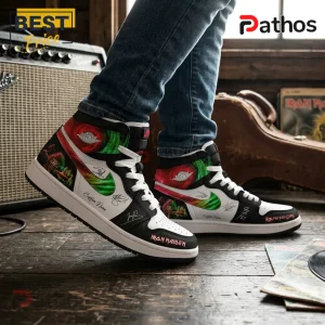 Custom Iron Maiden high-top sneakers with white, black, and red graphics, green swirls, and band logos on wooden floor.!