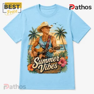 Light blue crew neck t-shirt featuring a cowboy playing acoustic guitar on a beach with palm trees and Summer Vibes text.!