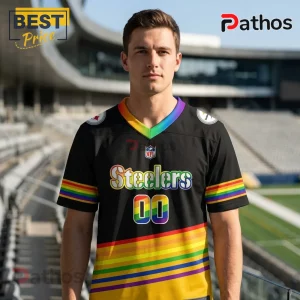 Pittsburgh Steelers x LGBT Pride Limited Edition Football Jersey 2 Man wearing a black Pittsburgh Steelers jersey with rainbow-colored lettering, number 00, and striped sleeve accents.!