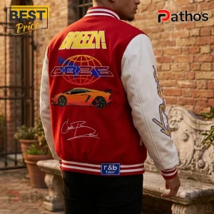 Red varsity jacket with white leather sleeves, back graphic of a globe, orange sports car, Breezy, CB26, and R&B tour text.!
