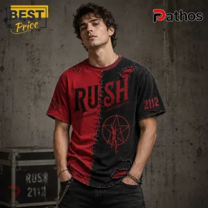 Man wearing a distressed split red and black Rush 2112 t-shirt with Starman logo graphic against a concrete background.!
