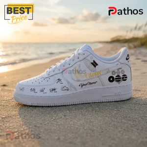 Custom white low-top sneaker featuring BTS-inspired signatures, a gold Swim graphic, and personalized text on a beach.!