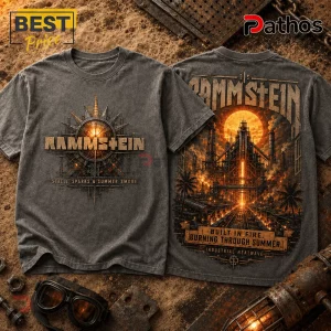 Rammstein Premium Vintage Charcoal T-Shirt 1 Charcoal grey vintage wash Rammstein graphic t-shirt featuring industrial factory art, orange sun, and metal typography.!