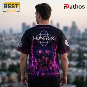 KPop Demon Hunters Milwaukee Brewers 2026 Edition Jersey 3 Back view of a person wearing a black jersey featuring Huntrax text, a purple cat face, and K-pop style female characters.!
