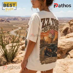 Woman wearing an off-white cotton t-shirt with ZZ Top Ice Cream Day graphic featuring a hot rod and desert landscape.!