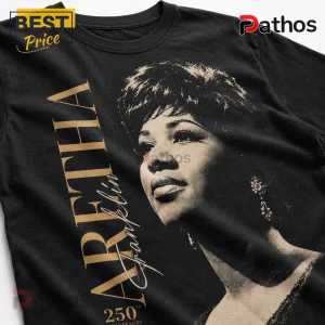 Aretha Franklin 1775-2025 Tribute Queen of Soul Casual T-Shirt 4 Black cotton t-shirt featuring a metallic gold graphic of Aretha Franklin and the text 250th Anniversary.!