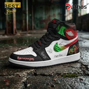 High-top sneaker with white, black, red, and green graphics, featuring text Run for your Lives and Iron Maiden art.!