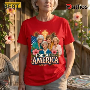 Red cotton crewneck t-shirt featuring The Golden Girls graphic, an American flag, a glowing cross, and God Bless America text.!
