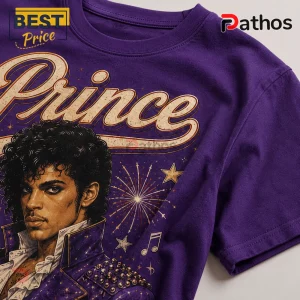 Prince Red White and Prince Retro Purple Cotton T-Shirt 4 Prince graphic t-shirt in purple cotton featuring a retro stylized portrait, firework illustrations, and cursive lettering.!