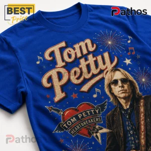 Tom Petty Red White and Blue Patriotic Illustrated Music T-Shirt 4 Royal blue cotton t-shirt featuring a Tom Petty graphic with a portrait, fireworks, musical notes, and a winged heart emblem.!