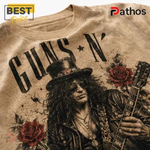 Guns N' Roses graphic t-shirt in beige featuring Slash wearing a top hat, sunglasses, and holding an electric guitar.!