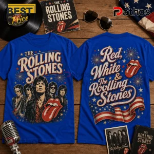 Blue Rolling Stones graphic t-shirt featuring band members and logo on front and back on a wooden surface with music items.!