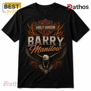Black cotton t-shirt featuring a Harley-Davidson logo, orange flames, a bald eagle, and text reading Barry Manilow.!