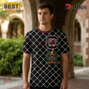 Man wearing South Carolina Gamecocks t-shirt with black white chain-link pattern and NCAA championship trophy graphics.!
