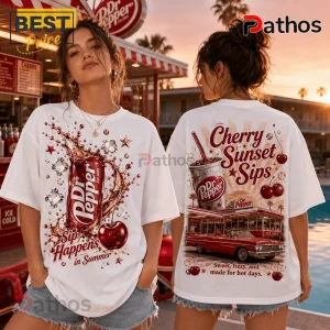 White oversized t-shirt featuring Dr. Pepper cherry soda graphics, splashing liquid, red vintage car, and sunset backdrop.!