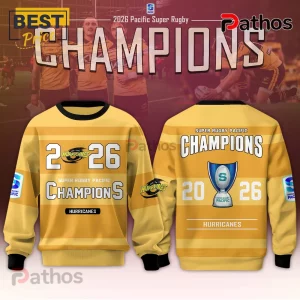 Yellow Hurricanes rugby sweatshirt featuring 2026 Pacific Super Rugby Champions graphics, trophy icon, and team branding.!