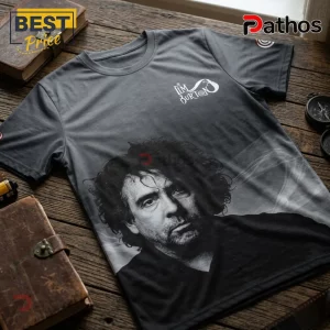 Grey crew neck t-shirt featuring a black and white portrait of Tim Burton and The Tim Burton logo on the chest.!