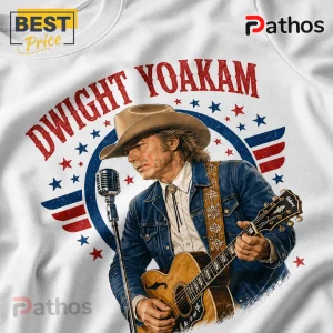 Dwight Yoakam graphic t-shirt featuring the singer in a cowboy hat and denim jacket playing an acoustic guitar.!
