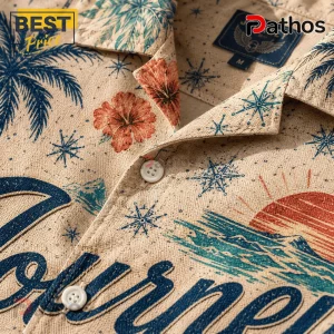 Tan short-sleeve button-down shirt with vintage tropical print, palm trees, orange hibiscus, and nautical star patterns.!