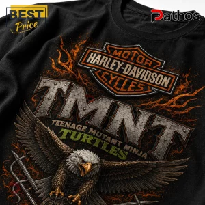Black cotton t-shirt featuring a Harley-Davidson logo, TMNT lettering, and a detailed bald eagle graphic with orange flames.!
