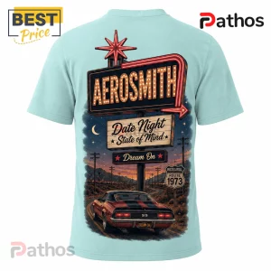 Aerosmith Road Trip Vibes Route 1973 Retro Car Graphic T-Shirt 2 Light blue t-shirt featuring an Aerosmith neon sign, muscle car, and Route 1973 road sign graphic on the back.!