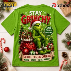Bright green t-shirt with Grinch graphic, Christmas tree, gift sack, and text Stay Grinchy, Too Cute To Steal Christmas.!