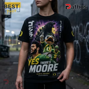 Black t-shirt featuring Oregon Ducks football player Dante Moore, the Duck mascot, Godzilla, and Japanese text graphics.!