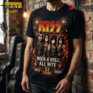 Black cotton t-shirt featuring a Kiss band graphic with fire, fireworks, and the text Rock & Roll All Nite 1973-2026.!