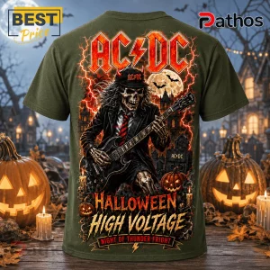 AC/DC High Voltage Pumpkin Skeleton T-Shirt featuring a skeletal guitarist in a graveyard with orange lightning effects.