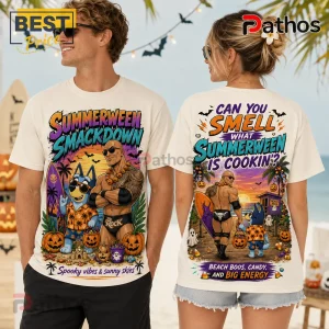The Rock x Bluey Summerween Beige T-Shirt showing front and back prints of The Rock and Bluey in a spooky beach scene.