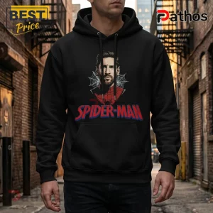 Messi x Spider-Man 2026 Edition Black Hoodie 2 Black hooded sweatshirt with a printed graphic of Lionel Messi wearing a Spider-Man suit, featuring spider webs and text.!