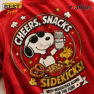 Snoopy x Budweiser Vintage Comic T-Shirt featuring Snoopy in sunglasses holding a beer can with Woodstock on red fabric.
