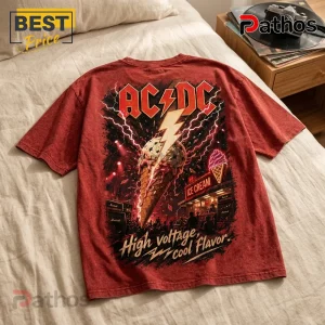 AC/DC Rock and Roll Red Acid Wash T-Shirt 2 Red mineral wash cotton t-shirt featuring AC/DC logo, lightning bolts, ice cream cone graphic, and text High Voltage.!