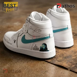 Ariana Grande Eternal Sunshine Tour Custom Air Jordan 1 Sneakers 2 Ariana Grande Eternal Sunshine Tour Custom Air Jordan 1 Sneakers featuring white leather, teal swoosh, and tour graphics.