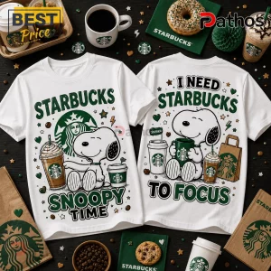 Snoopy Starbucks I Need To Focus T-Shirt featuring cartoon Snoopy graphics, coffee cups, and green text on white fabric.