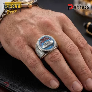Silver Iron Maiden Aces High championship ring with blue enamel inlay and engraved details worn on a finger.!