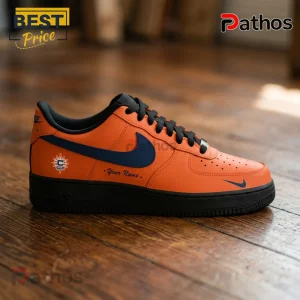 Connecticut Sun Orange Black Nike Air Force 1 Sneakers 2 Custom orange leather sneaker with navy blue swoosh, black laces, black sole, and custom logo on a wooden surface.!