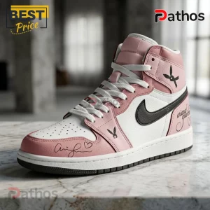 Ariana Grande Eternal Sunshine Tour Pink Air Jordan 1 Sneakers with black swoosh, signature details, and rabbit icons.