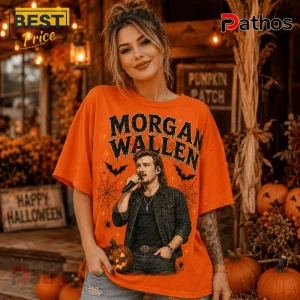 Morgan Wallen Spooky Season T-Shirt 2026 featuring a singer graphic, orange fabric, bats, spiders, and cobweb illustrations.