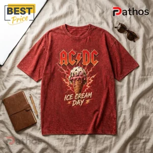 AC/DC Rock and Roll Red Acid Wash T-Shirt 1 Acid-washed red graphic t-shirt featuring an AC/DC logo above a melting ice cream cone and yellow lightning bolts.!