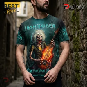 Iron Maiden Run For Your Lives 2026 Tour Apparel Hoodie 3 Man wearing green Iron Maiden graphic t-shirt featuring Eddie character playing a flaming guitar with Run For Your Life text.!